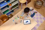 Overhead child building