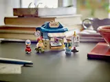 Corner Kiosk set displayed on a desk with minifigures.