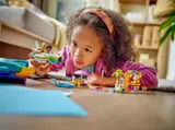Child playing with the LEGO seaplane.