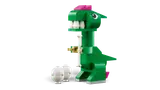 Green Lego T-Rex with bone and eggs.