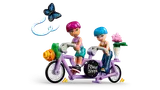 Minifigures on tandem bike.