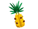 LEGO pineapple with green leaves.