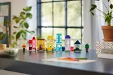 Lineup of colorful LEGO houses.