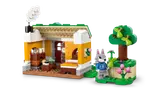 Audie's yellow house and spring tree.