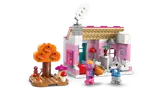 Rosie's pink house and fall tree.