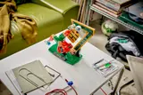 LEGO Ronaldo bicycle kick on table.