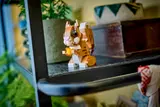 LEGO squirrel on a shelf.