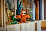 Owl displayed on bookshelf.