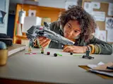 Child playing with Sith Infiltrator.