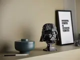 Vader Helmet on a home shelf.
