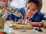 Child playing with Desert Skiff set.