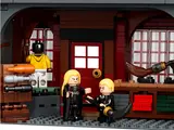 Malfoy family in Quidditch shop.