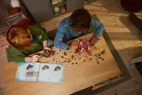 Kids building the Dino Jet set together.