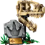 LEGO T. rex skull fossil model on display stand.