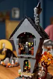 Person playing with LEGO Nightmare Before Christmas.