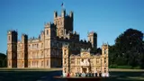 Downton Abbey LEGO in landscape.