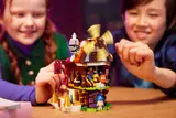 Kids playing with LEGO DREAMZzz village.