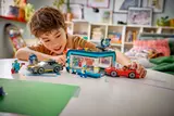 Child playing with LEGO car wash.