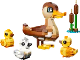 LEGO duck family with cattails on white.