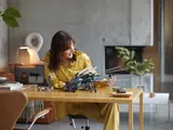 Woman holding Ornithopter.