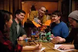 Group admiring D&D set.