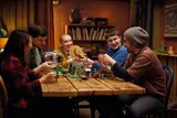Friends engaged with D&D set.