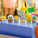 Easter models on blue surface.