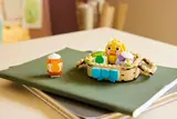 LEGO Easter Basket on a green book.