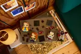 Overhead view of BrickHeadz and parts