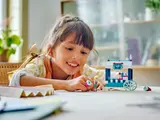 Child playing with Elsa's ice cream cart.