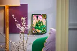 LEGO Emerald City set displayed on wall.
