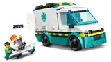 Paramedic loading skater into ambulance.