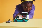 Child playing with ambulance interior.
