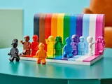 LEGO rainbow set with scattered minifigures.