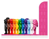 Side view of LEGO rainbow minifigures and wall.