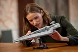 Person holding LEGO Executor Super Star Destroyer model.