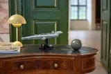 LEGO Executor Super Star Destroyer on a desk in a room setting.
