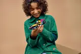 Person holding F1 ACADEMY™ car.