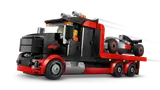 F1 truck with race car loaded.