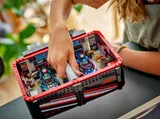 Child closing F1 garage for storage.
