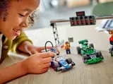 Child playing with F1 car