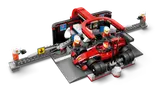 Top-down view of F1 pit stop.