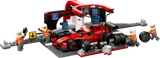 F1 car in pit stop with crew.