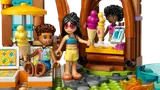 Close-up of LEGO Friends minifigures with ice cream cones at resort stand.