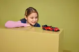 Girl admiring LEGO Ferrari 499P.