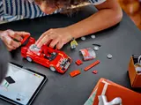 Child building LEGO Ferrari F40.