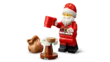 Santa with mug and cookie.