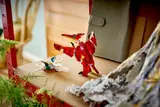 Pterodactyl model on shelf.
