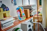 LEGO FIFA 2026 emblem on a bookshelf.