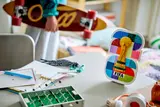 LEGO FIFA 2026 emblem on a desk with skateboard.